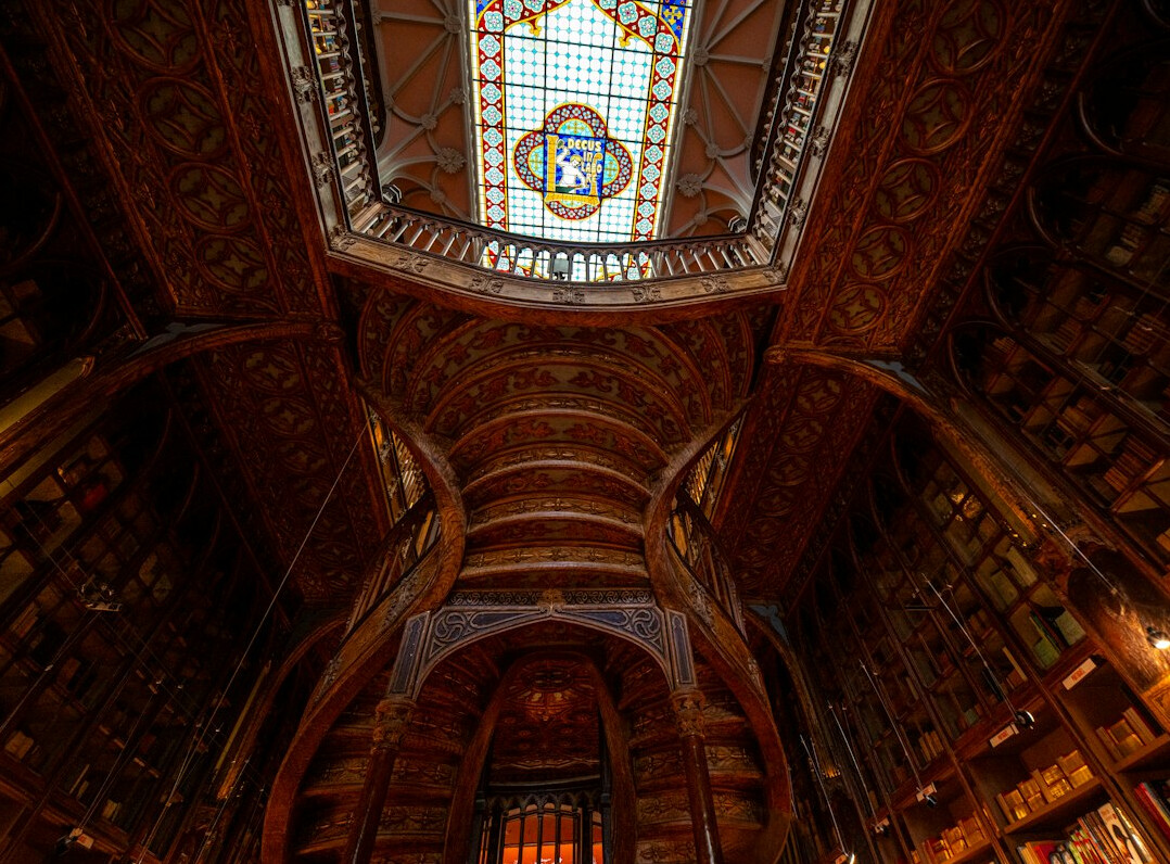 Old library interior with tall wooden bookshelves